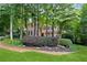 Inviting two-story home with lush landscaping and a covered front porch at 2722 Brookhaven Ln, Buford, GA 30518
