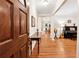 Welcoming foyer featuring hardwood floors, a console table, and views into the living spaces at 2722 Brookhaven Ln, Buford, GA 30518