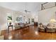 Open-concept floor plan with hardwood floors, tall ceilings, and plenty of natural light at 2722 Brookhaven Ln, Buford, GA 30518