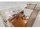 Sun-drenched living room features hardwood floors and an adjacent dining area at 2722 Brookhaven Ln, Buford, GA 30518