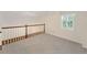 The loft area is ready to be a home office, playroom, or a reading nook at 2722 Brookhaven Ln, Buford, GA 30518