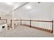 Spacious carpeted loft overlooking the lower level at 2722 Brookhaven Ln, Buford, GA 30518