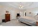 A well-appointed main bedroom with tray ceilings provides a serene retreat at 2722 Brookhaven Ln, Buford, GA 30518
