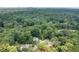 Overhead view of a home and its surroundings, nestled among lush greenery at 3590 Lee Se St, Smyrna, GA 30080