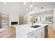 Bright kitchen with island, modern fixtures, and stainless steel appliances at 3590 Lee Se St, Smyrna, GA 30080