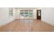 Bright living room with hardwood floors, and large windows offering outdoor views at 3590 Lee Se St, Smyrna, GA 30080