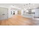 Open-concept living area connects to a modern kitchen with a large island at 3590 Lee Se St, Smyrna, GA 30080