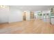 Open-concept living room with hardwood floors, built-in shelves, and bright natural light at 3590 Lee Se St, Smyrna, GA 30080