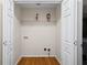 Organized closet with wood floors and white bi-fold doors at 69 Due West Pass, Dallas, GA 30157