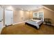 Cozy bedroom featuring carpeted floor, a bed and good light at 13042 Dartmore Ave, Alpharetta, GA 30005