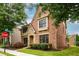 Charming brick home with manicured lawn and mature trees, set in a desirable neighborhood near Windward Ridge Drive at 13042 Dartmore Ave, Alpharetta, GA 30005