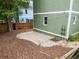 View of the stone patio area located in the home's backyard at 187 Vanira Se Ave, Atlanta, GA 30315