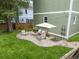 Relaxing backyard area with a patio set and lush green grass at 187 Vanira Se Ave, Atlanta, GA 30315