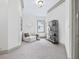 Bright bedroom space featuring an accent chair, bookshelf, and neutral carpet at 187 Vanira Se Ave, Atlanta, GA 30315