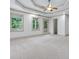 Bright, spacious bedroom with tray ceiling, large windows and exterior access at 187 Vanira Se Ave, Atlanta, GA 30315