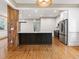 Stylish kitchen with stainless steel appliances, an island, and open design at 187 Vanira Se Ave, Atlanta, GA 30315