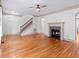 Spacious living room with hardwood floors, fireplace and stairs at 187 Vanira Se Ave, Atlanta, GA 30315