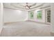 Spacious main bedroom with tray ceiling, and natural light at 187 Vanira Se Ave, Atlanta, GA 30315