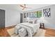 Cozy bedroom featuring a ceiling fan, ample natural light, and stylish décor at 3048 Briarcliff Ne Rd # 8, Atlanta, GA 30329