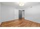 Spacious bedroom with hardwood floors, neutral walls, and multiple doorways at 3048 Briarcliff Ne Rd # 8, Atlanta, GA 30329