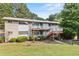 Exterior view of the building showcasing its architecture and landscaped grounds at 3048 Briarcliff Ne Rd # 8, Atlanta, GA 30329