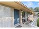 Inviting front porch with seating area and a brick exterior at 3048 Briarcliff Ne Rd # 8, Atlanta, GA 30329