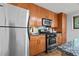 Well-lit kitchen with stainless steel appliances and granite countertops at 3048 Briarcliff Ne Rd # 8, Atlanta, GA 30329