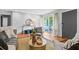 Comfortable living room featuring a textured rug, modern furniture, and natural light at 3048 Briarcliff Ne Rd # 8, Atlanta, GA 30329