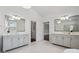 Elegant bathroom features dual vanities with marble countertops and modern fixtures at 3185 Casteel Ne Rd, Marietta, GA 30062