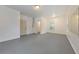 Bonus room with neutral paint, LVP flooring, and plenty of space to make it your own at 3185 Casteel Ne Rd, Marietta, GA 30062
