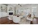 Cozy living room with a fireplace, built-in bookshelves, and comfortable seating arrangement at 3185 Casteel Ne Rd, Marietta, GA 30062