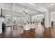 Spacious living room showcasing coffered ceilings, hardwood floors, and expansive views of the outdoor area at 3185 Casteel Ne Rd, Marietta, GA 30062