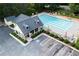 Well-maintained pool with inviting pool house surrounded by manicured landscaping and ample parking at 4146 Mcever Park Dr, Acworth, GA 30101