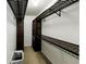 Organized walk-in closet with custom shelving and hanging rods, optimizing storage space at 4146 Mcever Park Dr, Acworth, GA 30101