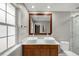 Modern bathroom features double sinks, updated fixtures, and a spacious shower at 713 S Fairfield Dr, Peachtree City, GA 30269