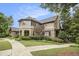 Beautiful clubhouse with stone and shingle exterior, mature landscaping, and inviting entryway at 892 Gramercy Hills Ln, Mableton, GA 30126