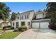Charming two-story home with manicured lawn, inviting front porch, and attached two car garage at 892 Gramercy Hills Ln, Mableton, GA 30126