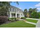 Charming two-story home with a welcoming front porch and beautifully landscaped front yard at 892 Gramercy Hills Ln, Mableton, GA 30126