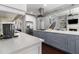 Open-concept kitchen boasts stainless steel appliances, large island, and seamless flow to the living area at 892 Gramercy Hills Ln, Mableton, GA 30126