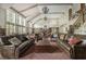 Spacious lounge area with high ceilings, elegant chandeliers, and comfortable seating at 892 Gramercy Hills Ln, Mableton, GA 30126