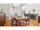 Open-concept kitchen with large island, stainless appliances, and easy access to the dining area at 1160 Foster Nw Pl, Atlanta, GA 30318