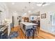 Bright kitchen boasts a spacious island, modern appliances, and opens to the dining area at 1160 Foster Nw Pl, Atlanta, GA 30318