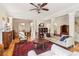 Spacious living room with hardwood floors, fireplace, and large windows offering natural light at 1160 Foster Nw Pl, Atlanta, GA 30318