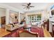 Bright living room with hardwood floors, fireplace, and comfortable seating arrangement, creating a welcoming space at 1160 Foster Nw Pl, Atlanta, GA 30318