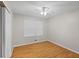 Simple bedroom with laminate flooring, ceiling fan and window with blinds at 1594 Pine Glen Cir, Decatur, GA 30035