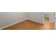 Compact bedroom showcasing laminate flooring and neutral wall color at 1594 Pine Glen Cir, Decatur, GA 30035