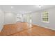 Open floor plan featuring hardwood floors and a view of the kitchen at 1594 Pine Glen Cir, Decatur, GA 30035