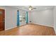 Open-concept living area with hardwood flooring, lots of natural light, and a ceiling fan at 1594 Pine Glen Cir, Decatur, GA 30035