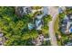 Overhead view of a neighborhood featuring large homes, mature landscaping, and community-oriented street layout at 314 Savannah Pl, Loganville, GA 30052
