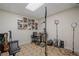 Finished basement with bookcase, tile ceiling, and accent lighting at 314 Savannah Pl, Loganville, GA 30052